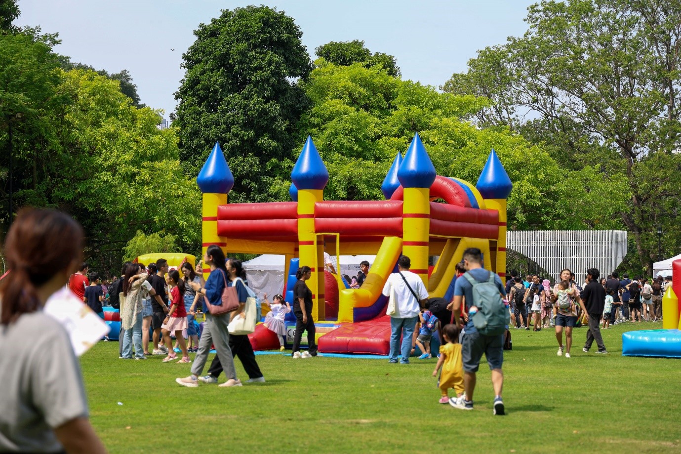 A bouncy castle at the outdoor carnival at HTX Family Day 2025.